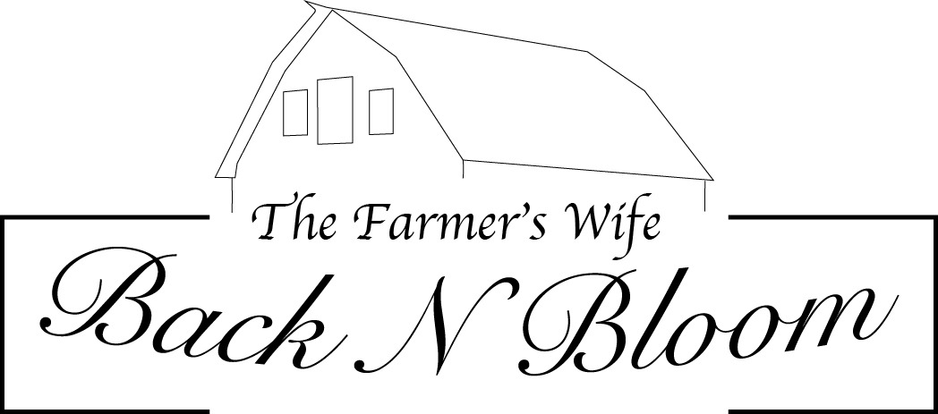 Compact black and white floral shop logo refinement